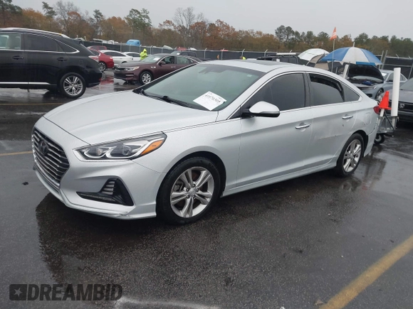 2018 Hyundai Sonata SEL with VIN 5NPE34AF0JH696872, listed as a IAAI auction lot 41070305 with 121,000 mi miles and . Bid and sale history available at DreamBid. Image 17.