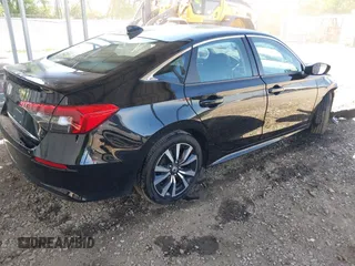 2023 Honda Civic EX with VIN 2HGFE1F73PH320247, listed as a IAAI auction lot 42148175 with 40,454 mi miles and . Bid and sale history available at DreamBid. Image 4.