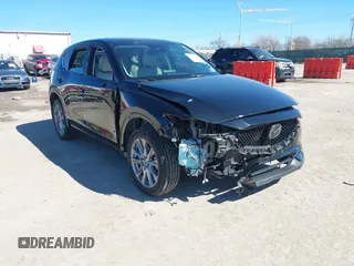 2020 Mazda CX-5 Grand Touring with VIN JM3KFBDMXL0763316, listed as a IAAI auction lot 41661958 with 64,881 mi miles and . Bid and sale history available at carsss.com. Image 1.