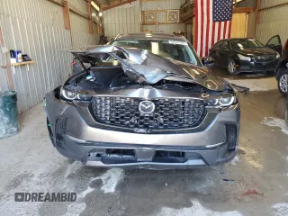 2024 Mazda CX-50 S Premium с VIN 7MMVABDMXRN173083, выставлен на аукционе Copart как лот 54336165 с пробегом 11 410 миль миль и Списание • Salvage title. История ставок и продаж доступна на DreamBid. Изображение 5.