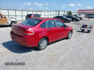 2009 Ford Focus S with VIN 1FAHP34N69W102568, listed as a IAAI auction lot 42137185 with 113,099 mi miles. Bid and sale history available at carsss.com. Image 4.