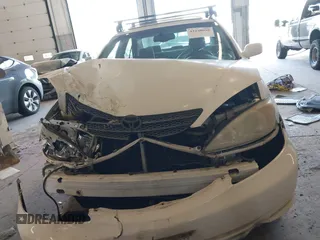 2004 Toyota Camry LE with VIN JTDBE32K540257588, listed as a IAAI auction lot 42208098 with 201,770 mi miles and . Bid and sale history available at DreamBid. Image 12.