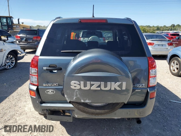 2006 Suzuki Grand Vitara Premium z VIN JS3TD943864102742, wystawiony jako Copart lot #70721944 z przebiegiem 117 402 mil mil oraz Szkoda całkowita • Salvage title. Historia ofert i sprzedaży dostępna na DreamBid. Obrazek 6.