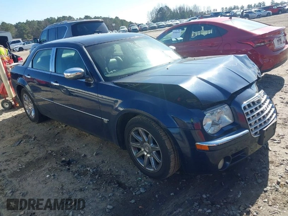 2005 Chrysler 300 with VIN 2C3JA63HX5H654114, listed as a IAAI auction lot 41469161 with 136,104 mi miles. Bid and sale history available at carsss.com. Image 1.
