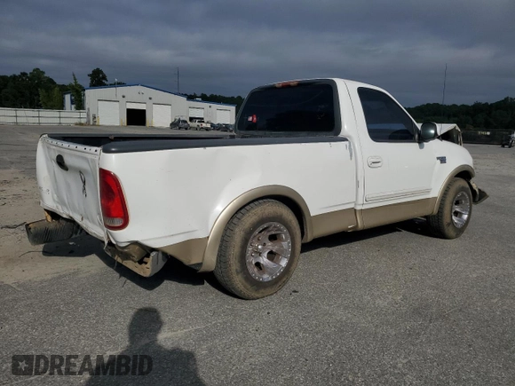 1999 Ford F-150 XL with VIN 1FTRF17L8XNA75702, listed as a Copart auction lot 69868104 with Not provided miles and Salvage title. Bid and sale history available at DreamBid. Image 3.