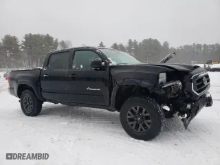 2023 Toyota Tacoma 4WD SR with VIN 3TYCZ5AN3PT149184, listed as a Copart auction lot 42582075 with 76,365 mi miles and Salvage Title. Bid and sale history available at carsss.com. Image 4.