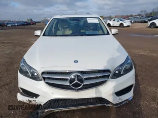 2014 Mercedes-Benz E 550 Sport with VIN WDDHF9BB5EA949457, listed as a IAAI auction lot 41128583 with 99,248 mi miles and . Bid and sale history available at DreamBid. Image 12.