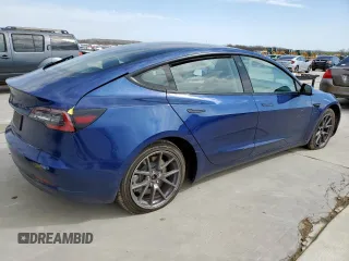 2021 Tesla Model 3 Standard Range Plus z VIN 5YJ3E1EA0MF014607, wystawiony jako Copart lot #47290835 z przebiegiem 43 251 mil mil oraz Szkoda całkowita • Salvage title. Historia ofert i sprzedaży dostępna na DreamBid. Obrazek 3.