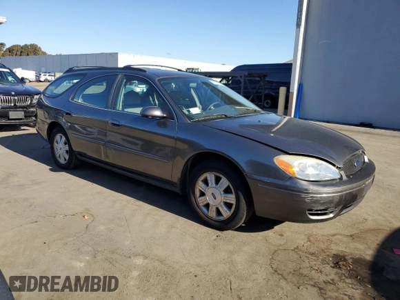 2005 Ford Taurus z VIN 1FAHP59U15A158162, wystawiony jako Copart lot #81109994 z przebiegiem 81 196 mil mil oraz Czysty tytuł • Clean title. Historia ofert i sprzedaży dostępna na DreamBid. Obrazek 4.
