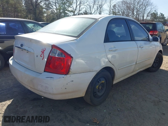 2004 Kia Spectra LX with VIN KNAFE121745036331, listed as a IAAI auction lot 41735613 with 67,634 mi miles. Bid and sale history available at carsss.com. Image 4.
