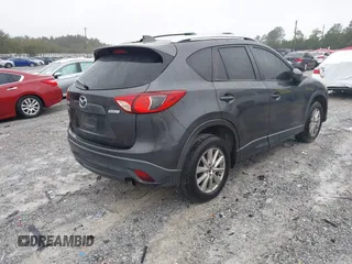 2015 Mazda CX-5 Touring with VIN JM3KE2CY4F0435563, listed as a IAAI auction lot 41311988 with 187,183 mi miles. Bid and sale history available at carsss.com. Image 4.