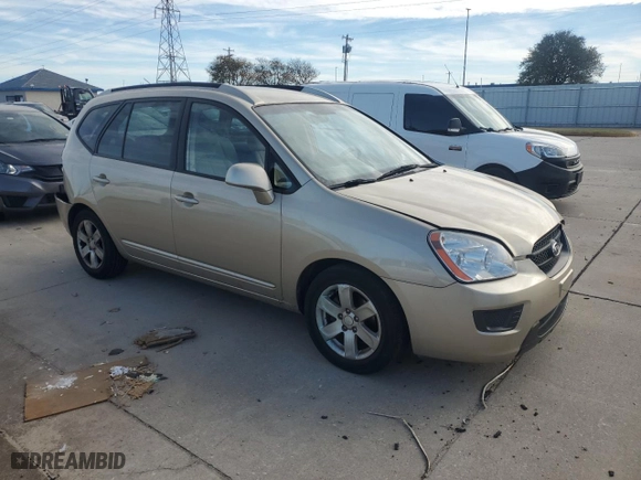 2007 Kia Rondo LX with VIN KNAFG526X77040461, listed as a Copart auction lot 77202004 with 125,132 mi miles and Salvage Title. Bid and sale history available at carsss.com. Image 4.