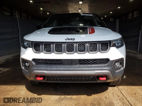 2023 Jeep Compass Trailhawk z VIN 3C4NJDDN1PT527851, wystawiony jako Copart lot #65566035 z przebiegiem 52 811 mil mil oraz Czysty tytuł • Clean title. Historia ofert i sprzedaży dostępna na DreamBid. Obrazek 5.