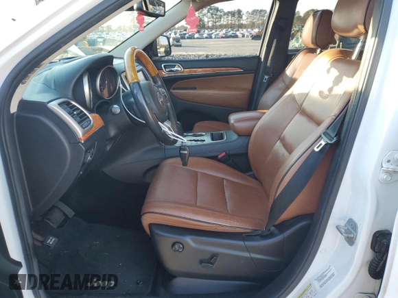 2013 Jeep Grand Cherokee Overland with VIN 1C4RJECG9DC644823, listed as a Copart auction lot 83232414 with 193,205 mi miles and Salvage Title. Bid and sale history available at carsss.com. Image 7.