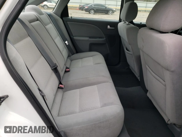 2005 Ford Five Hundred SE z VIN 1FAFP231X5G165841, wystawiony jako Copart lot #43117535 z przebiegiem 154 874 mil mil oraz Czysty tytuł • Clean title. Historia ofert i sprzedaży dostępna na DreamBid. Obrazek 10.