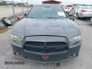 2014 Dodge Charger Police z VIN 2C3CDXAT9EH191184, wystawiony jako IAAI lot #42468882 z przebiegiem 202 790 mil mil oraz . Historia ofert i sprzedaży dostępna na DreamBid. Obrazek 6.