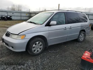 2002 Honda Odyssey EX z VIN 2HKRL18692H578746, wystawiony jako Copart lot #51281845 z przebiegiem 282 844 mil mil oraz Szkoda całkowita • Salvage title. Historia ofert i sprzedaży dostępna na DreamBid. Obrazek 1.