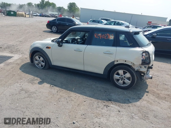 2015 MINI Hardtop 4 Door with VIN WMWXS5C5XFT827330, listed as a IAAI auction lot 42402965 with 140,648 mi miles and . Bid and sale history available at DreamBid. Image 3.