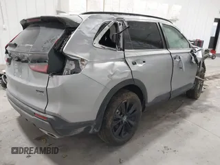 2023 Honda CR-V Sport Touring with VIN 5J6RS6H96PL013684, listed as a IAAI auction lot 41269937 with 17,631 mi miles and . Bid and sale history available at DreamBid. Image 4.