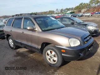 2005 Hyundai Santa Fe GLS z VIN KM8SC13D45U929446, wystawiony jako IAAI lot #41200311 z przebiegiem 157 669 mil mil oraz . Historia ofert i sprzedaży dostępna na DreamBid. Obrazek 1.