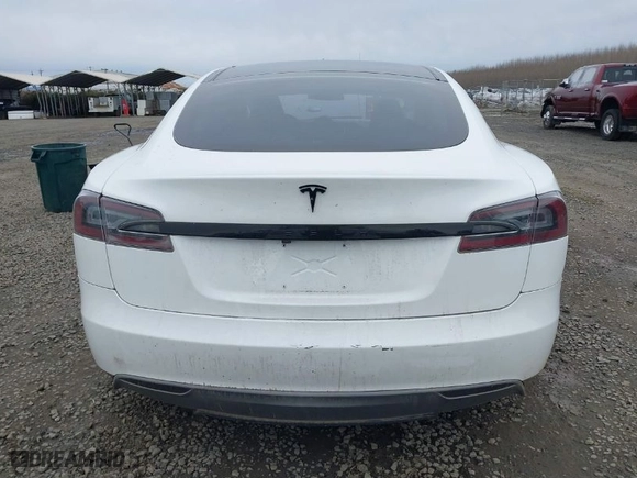 2013 Tesla Model S with VIN 5YJSA1CG3DFP16662, listed as a IAAI auction lot 41652712 with 105,176 mi miles. Bid and sale history available at carsss.com. Image 16.
