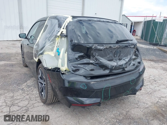 2024 BMW iX xDrive50 z VIN WB523CF03RCN81221, wystawiony jako IAAI lot #42029754 z przebiegiem Nie podano mil oraz . Historia ofert i sprzedaży dostępna na DreamBid. Obrazek 6.