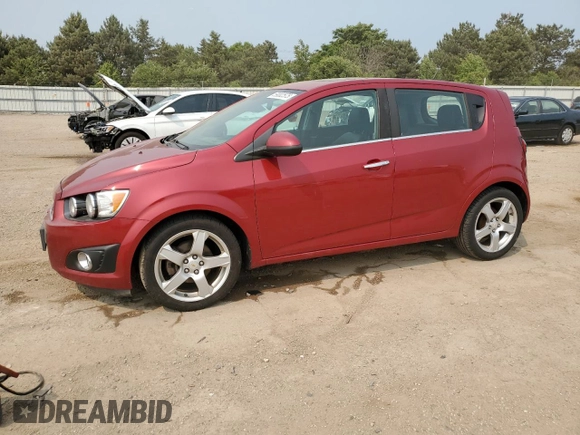 2012 Chevrolet Sonic LTZ with VIN 1G1JE6SH7C4111176, listed as a Copart auction lot 59002575 with 116,640 mi miles and Salvage title. Bid and sale history available at DreamBid. Image 1.