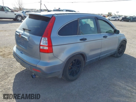 2009 Honda CR-V EX with VIN JHLRE38599C004833, listed as a IAAI auction lot 41982725 with 212,280 mi miles and . Bid and sale history available at carsss.com. Image 4.
