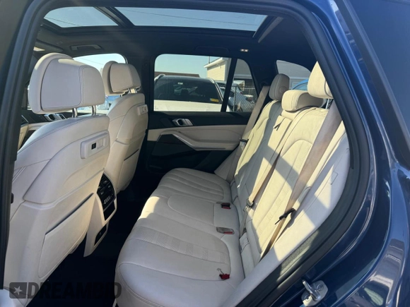 2021 BMW X5 M50i with VIN 5UXJU4C00M9H36466, listed as a Copart auction lot 77444344 with 100,119 mi miles and Clean Title. Bid and sale history available at carsss.com. Image 5.