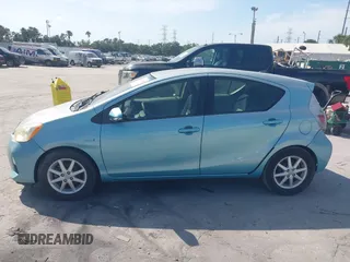 2013 Toyota Prius One z VIN JTDKDTB38D1039697, wystawiony jako IAAI lot #42378154 z przebiegiem 177 044 mil mil oraz . Historia ofert i sprzedaży dostępna na DreamBid. Obrazek 14.