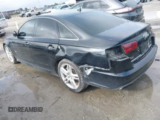 2016 Audi A6 Premium Plus z VIN WAUGFAFCXGN121312, wystawiony jako IAAI lot #41923717 z przebiegiem 215 000 mil mil oraz . Historia ofert i sprzedaży dostępna na DreamBid. Obrazek 3.