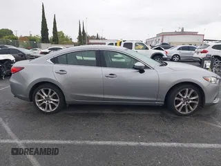 2014 Mazda 6 i Touring with VIN JM1GJ1V60E1141831, listed as a IAAI auction lot 42131200 with 86,597 mi miles and . Bid and sale history available at DreamBid. Image 13.