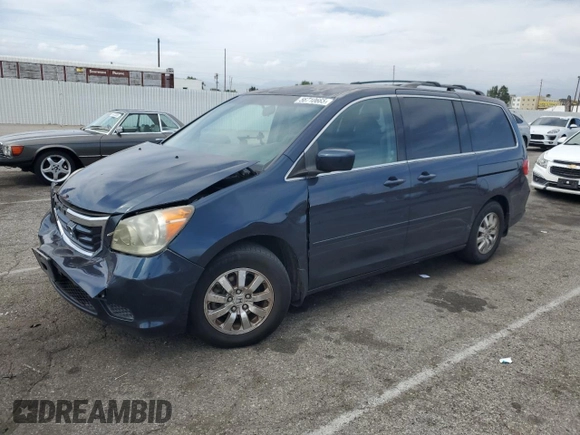 2010 Honda Odyssey EX with VIN 5FNRL3H46AB105054, listed as a Copart auction lot 56710665 with 118,156 mi miles and Salvage title. Bid and sale history available at DreamBid. Image 1.