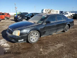 2004 Cadillac DeVille DTS z VIN 1G6KF57944U253624, wystawiony jako Copart lot #49444905 z przebiegiem 174 823 mil mil oraz Szkody całkowita. Historia ofert i sprzedaży dostępna na DreamBid. Obrazek 1.