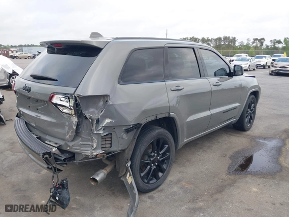 2021 Jeep Grand Cherokee Laredo X with VIN 1C4RJEAG4MC597302, listed as a IAAI auction lot 41919123 with 63,849 mi miles. Bid and sale history available at carsss.com. Image 4.