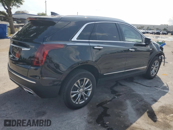 2022 Cadillac XT5 FWD Premium Luxury z VIN 1GYKNCRS7NZ101131, wystawiony jako Copart lot #56365065 z przebiegiem 74 168 mil mil oraz Szkoda całkowita • Salvage title. Historia ofert i sprzedaży dostępna na DreamBid. Obrazek 3.