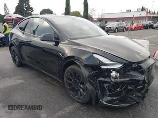2023 Tesla Model Y Long Range with VIN 7SAYGDEE2PA024032, listed as a IAAI auction lot 41213403 with 23,418 mi miles and . Bid and sale history available at DreamBid. Image 1.