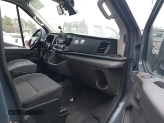 2020 Ford Transit Cargo with VIN 1FTBR3X85LKA55712, listed as a IAAI auction lot 41027144 with 125,658 mi miles. Bid and sale history available at carsss.com. Image 5.