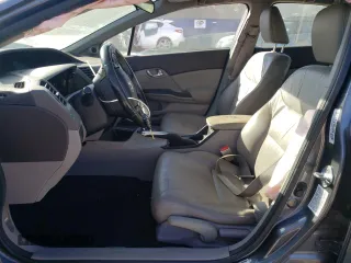 2012 Honda Civic EX-L with VIN 19XFB2F94CE048523, listed as a Copart auction lot 77019404 with 210,391 mi miles and Salvage Title. Bid and sale history available at DreamBid. Image 7.