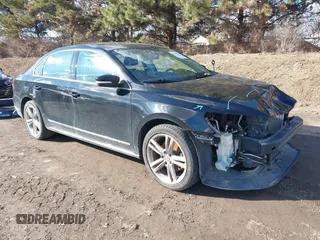 2014 Volkswagen Passat TDI SEL Premium with VIN 1VWCN7A33EC092174, listed as a IAAI auction lot 41690739 with 141,095 mi miles. Bid and sale history available at carsss.com. Image 1.