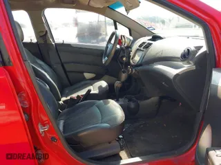 2014 Chevrolet Spark LT with VIN KL8CD6S9XEC559330, listed as a IAAI auction lot 42013533 with 94,009 mi miles. Bid and sale history available at carsss.com. Image 5.