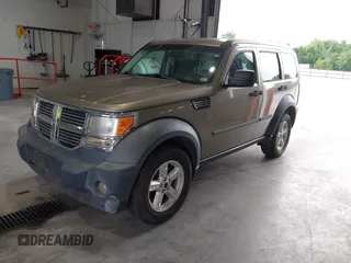 2007 Dodge Nitro SXT with VIN 1D8GU28K87W583835, listed as a IAAI auction lot 42678589 with 155,655 mi miles and . Bid and sale history available at DreamBid. Image 2.