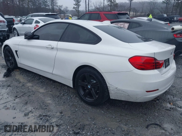 2014 BMW 4 Series 428i with VIN WBA3N7C52EF718794, listed as a IAAI auction lot 41416632 with 179,681 mi miles and . Bid and sale history available at carsss.com. Image 3.