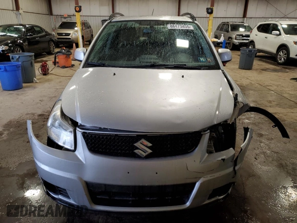 2010 Suzuki SX4 z VIN JS2YB5A31A6302436, wystawiony jako Copart lot #88473455 z przebiegiem 78 839 mil mil oraz Szkody całkowita. Historia ofert i sprzedaży dostępna na DreamBid. Obrazek 5.