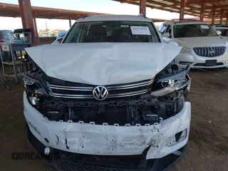 2017 Volkswagen Tiguan S with VIN WVGAV7AXXHK026143, listed as a IAAI auction lot 42257624 with 87,327 mi miles and . Bid and sale history available at DreamBid. Image 12.