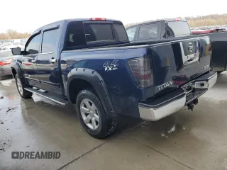 2010 Nissan Titan XE with VIN 1N6AA0EJ8AN313124, listed as a Copart auction lot 82052444 with 160,023 mi miles and Salvage Title. Bid and sale history available at carsss.com. Image 2.