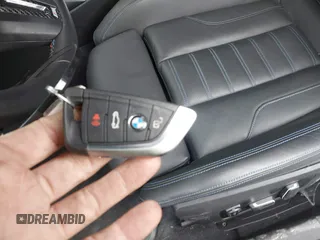 2024 BMW M2 with VIN 3MF13DM05R8E75611, listed as a IAAI auction lot 41010013 with 3,396 mi miles. Bid and sale history available at carsss.com. Image 11.