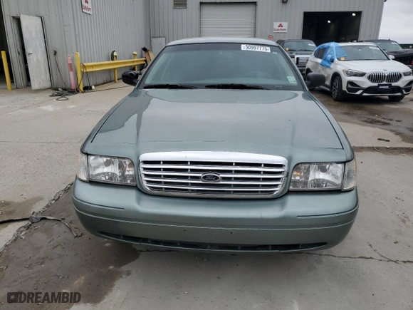 2006 Ford Crown Victoria LX with VIN 2FAFP74W66X132385, listed as a Copart auction lot 50997775 with 214,277 mi miles and Salvage Title. Bid and sale history available at carsss.com. Image 5.