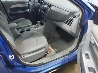 2007 Chrysler Sebring Touring z VIN 1C3LC56K57N508248, wystawiony jako IAAI lot #42305748 z przebiegiem 174 621 mil mil oraz . Historia ofert i sprzedaży dostępna na DreamBid. Obrazek 5.