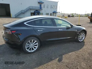 2020 Tesla Model 3 Standard Range Plus with VIN 5YJ3E1EA8LF609364, listed as a Copart auction lot 58828794 with 127,781 mi miles and Non Repairable. Bid and sale history available at DreamBid. Image 3.